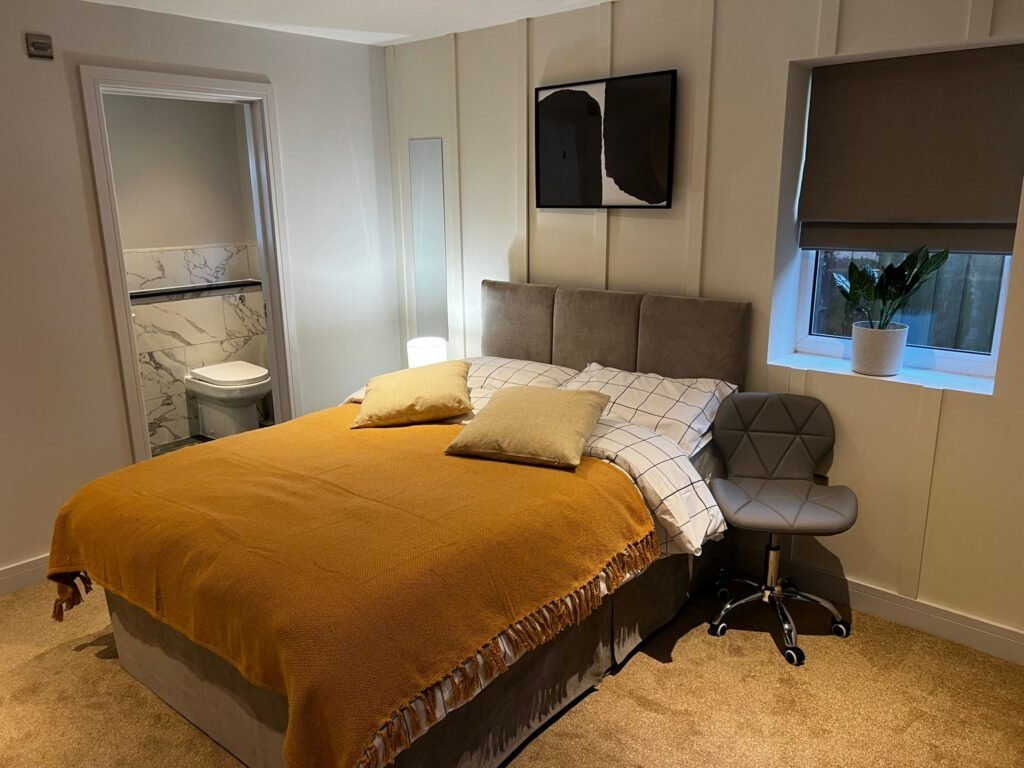 Modern en-suite bedroom in a completed rear extension in Ipswich